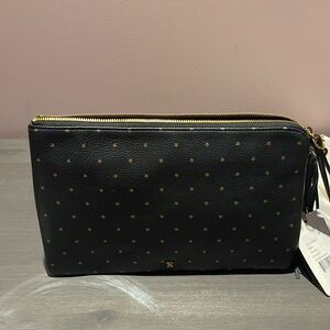 Hobo wristlet with slots for chg cards. Zipper pocket inside and another pocket